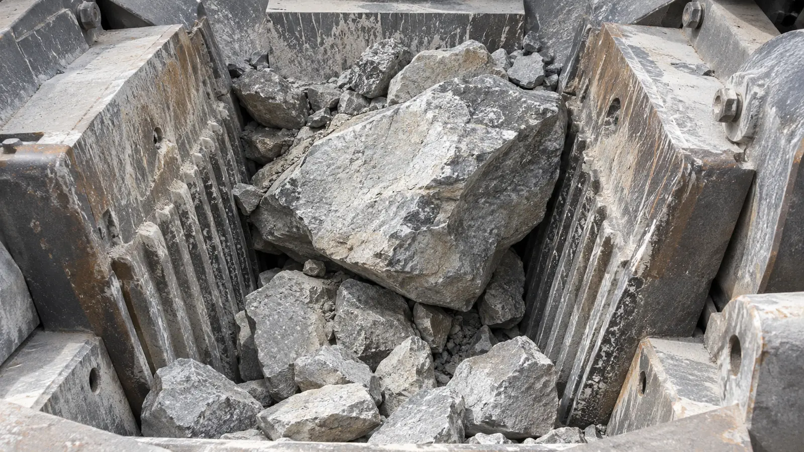AI-generated view of an oversized rock blocking a jaw crusher